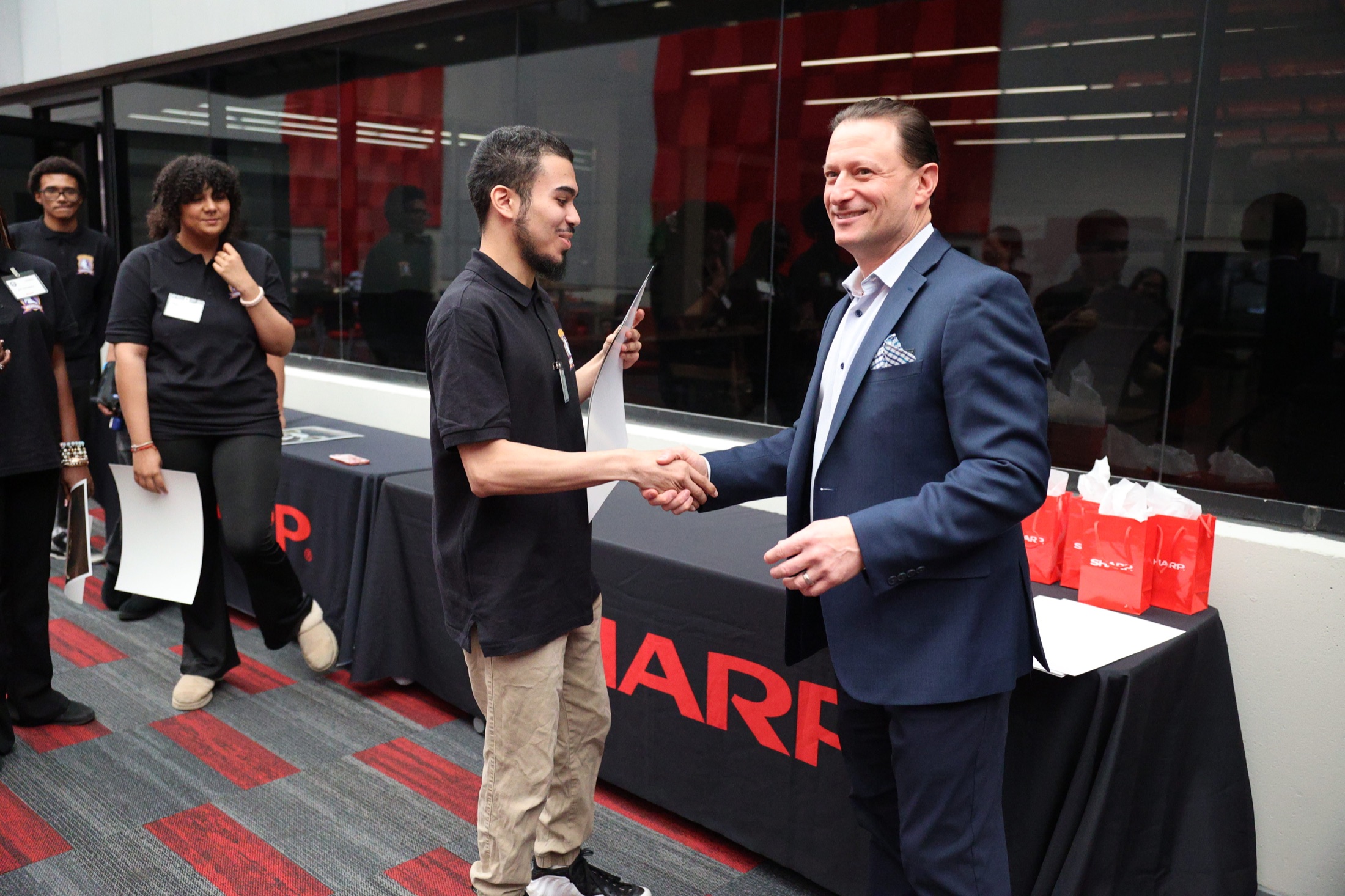 Student being recognized for completed program work
